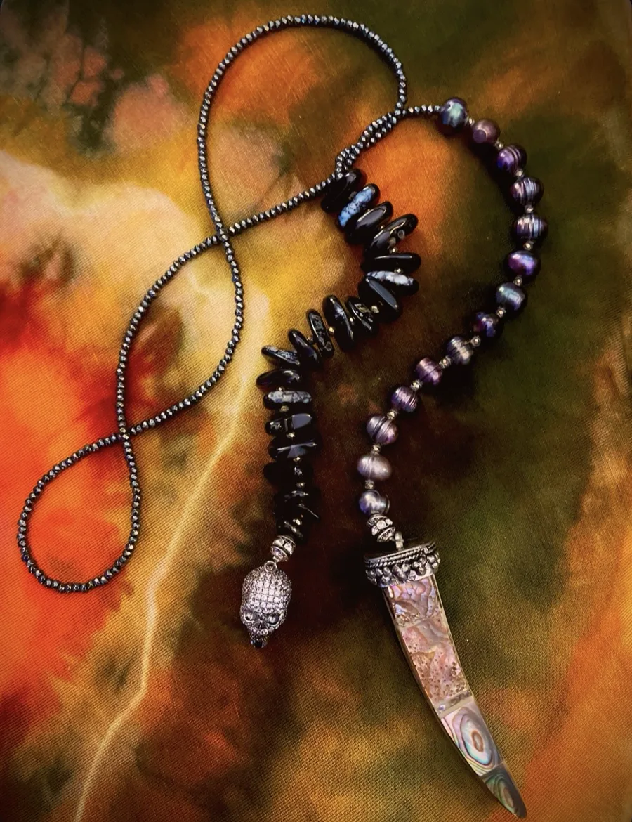 Black and purple gemstone lovebeads with sculptural charms