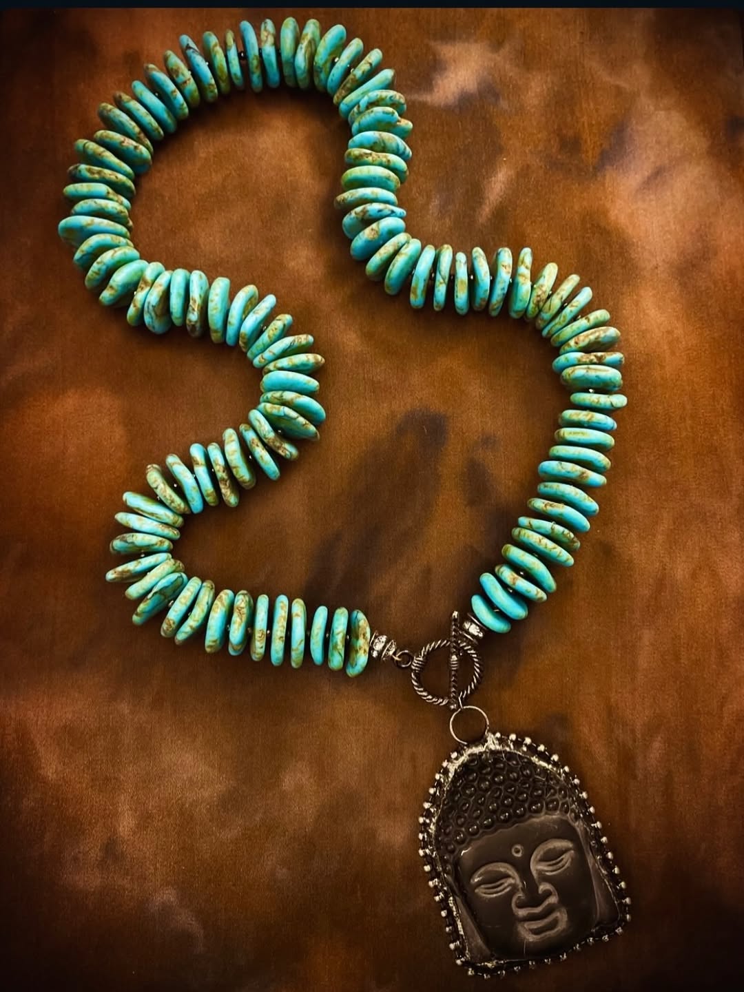 Large turquoise Buddha necklace